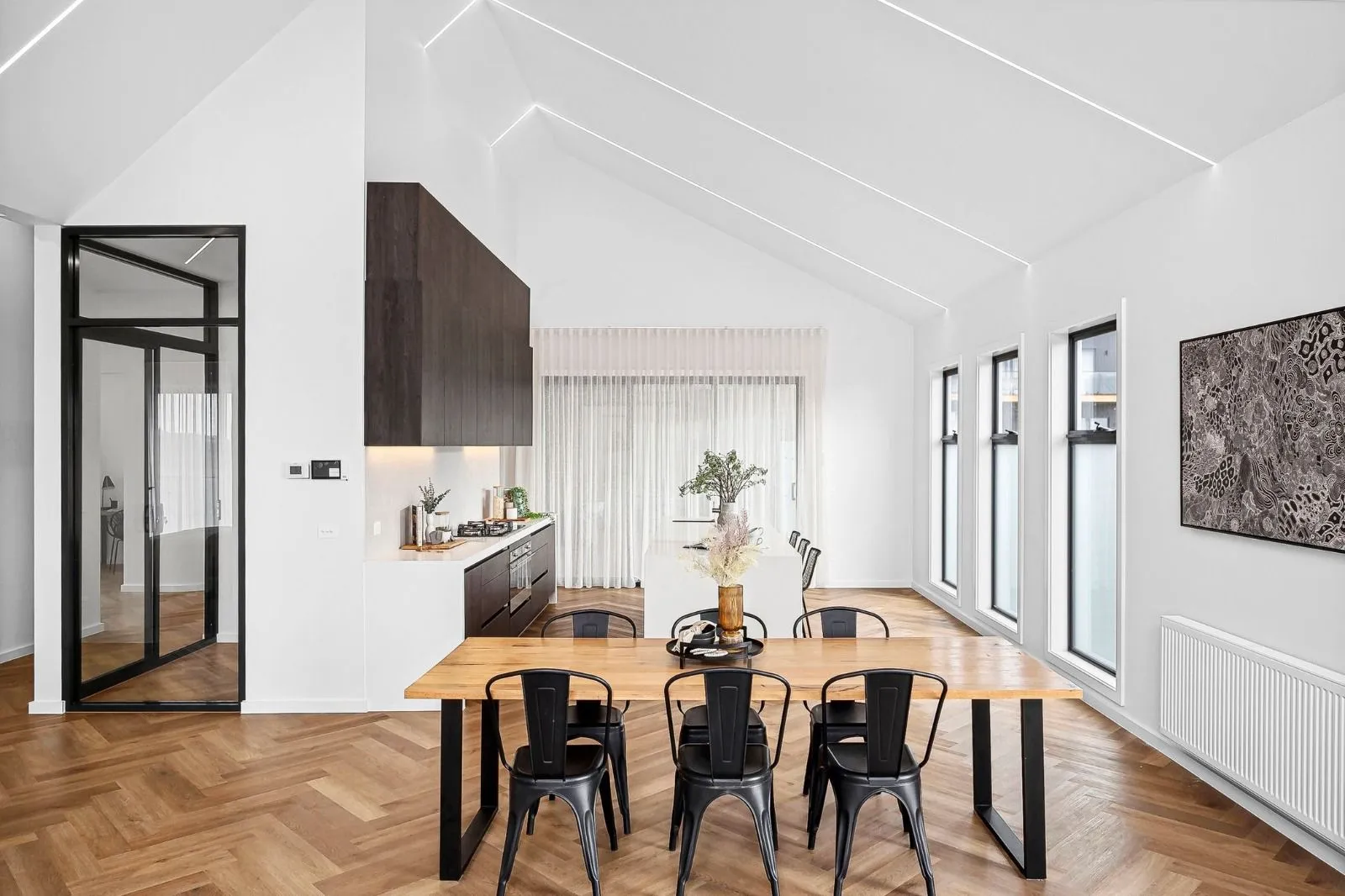 Hybrid oak-look flooring through an open living area